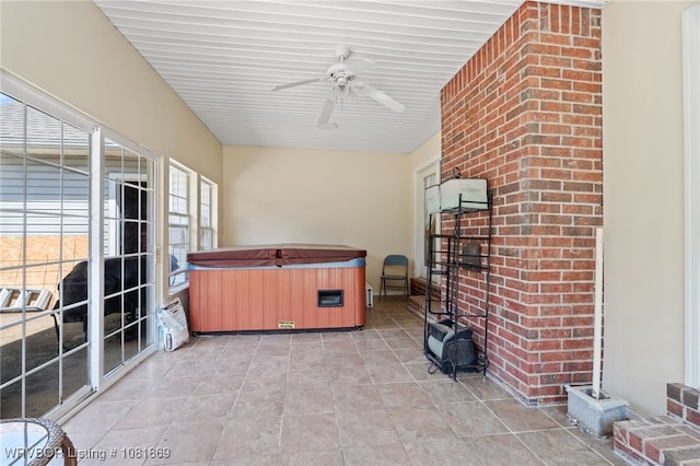 3109 Twin Lakes Pl, Alma, AR 72921 - sunroom / solarium featuring a hot tub and ceiling fan