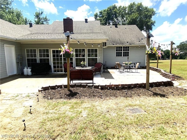 3109 Twin Lakes Pl, Alma, AR 72921 - rear view of property with a patio area, a lawn, and roof with shingles