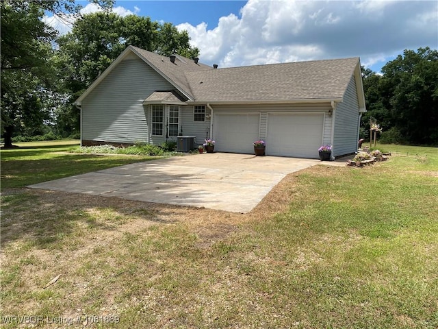 3109 Twin Lakes Pl, Alma, AR 72921 - view of front facade with a garage, a front yard, concrete driveway, and roof with shingles