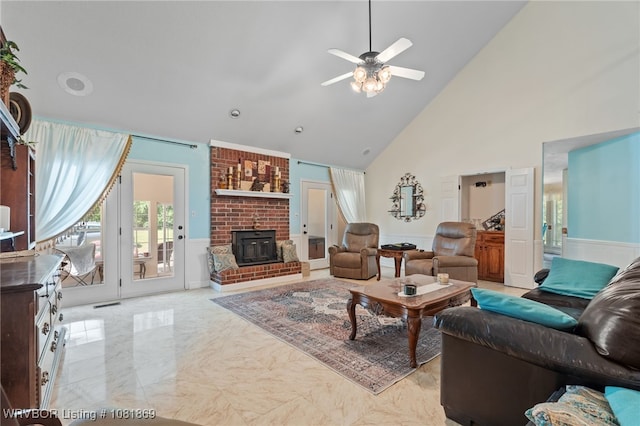 3109 Twin Lakes Pl, Alma, AR 72921 - living area featuring high vaulted ceiling, ceiling fan, a wainscoted wall, and light marble finish flooring