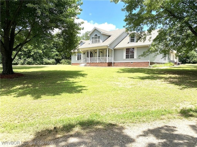 3109 Twin Lakes Pl, Alma, AR 72921 - view of front of home with covered porch, a front lawn, and roof with shingles