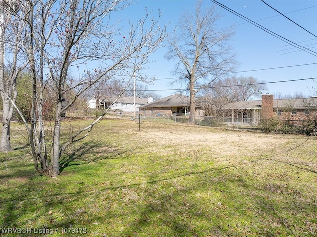 view of yard featuring fence