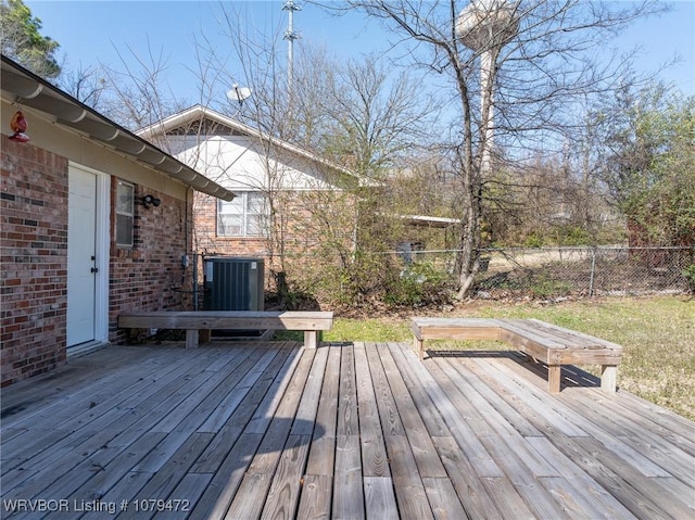 wooden deck with cooling unit and fence