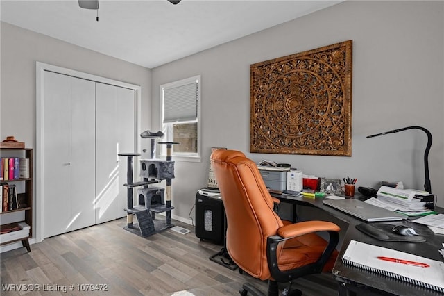 office with wood finished floors and ceiling fan