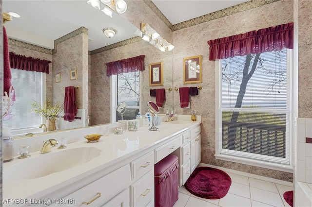 full bathroom featuring tile patterned flooring, a sink, and double vanity