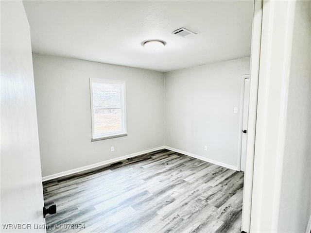 empty room featuring light hardwood / wood-style floors