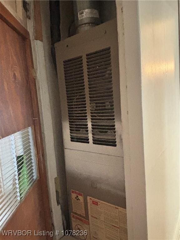404 Loy Ave, Arkoma, OK 74901 - interior space featuring heating unit