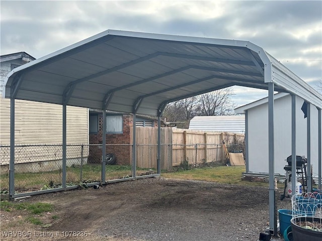 view of parking / parking lot featuring a carport