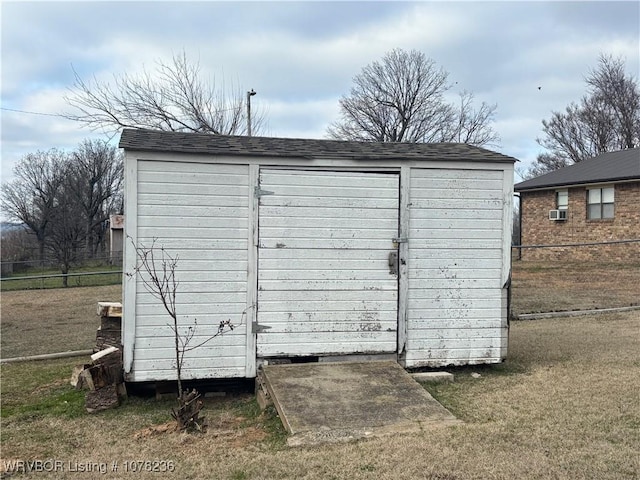 view of outdoor structure with a yard