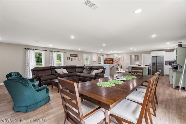14008 White Bluff Rd, Fort Smith, AR 72916 - dining area with recessed lighting, light wood-type flooring, and a chandelier