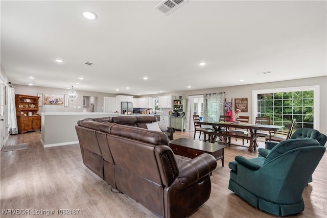 14008 White Bluff Rd, Fort Smith, AR 72916 - living area with recessed lighting, light wood-style floors, and a chandelier