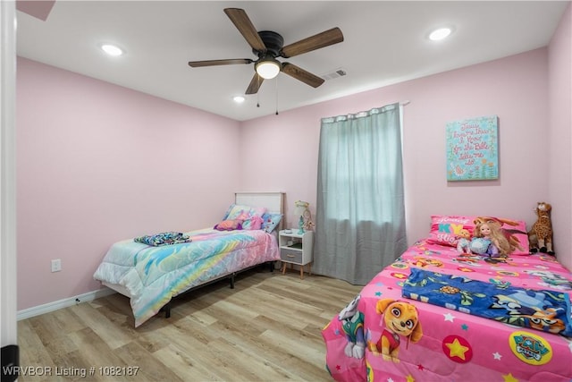 14008 White Bluff Rd, Fort Smith, AR 72916 - bedroom with wood finished floors, ceiling fan, and recessed lighting