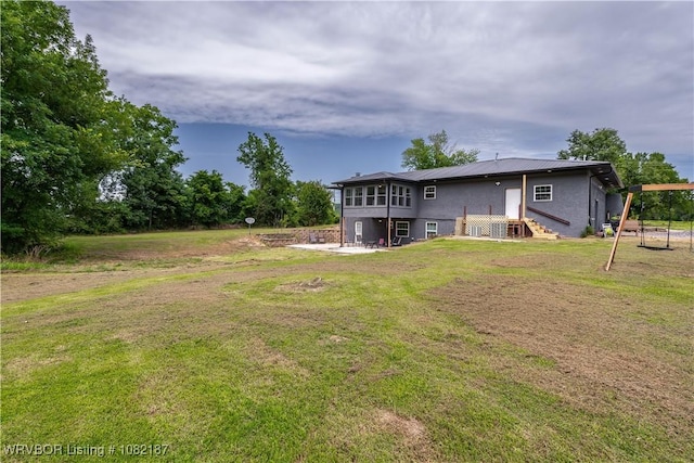 14008 White Bluff Rd, Fort Smith, AR 72916 - back of house featuring a lawn and a metal roof