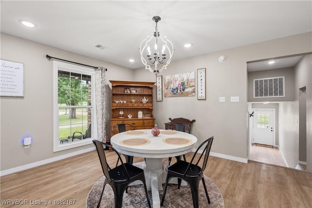 14008 White Bluff Rd, Fort Smith, AR 72916 - dining space featuring light wood-style floors, a chandelier, plenty of natural light, and recessed lighting