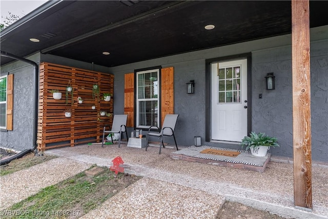 14008 White Bluff Rd, Fort Smith, AR 72916 - property entrance with covered porch and stucco siding