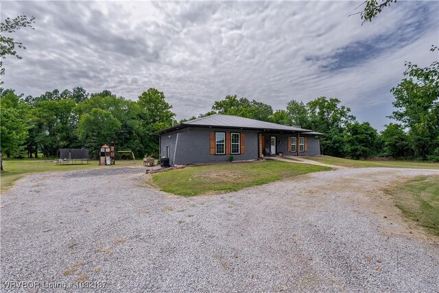 14008 White Bluff Rd, Fort Smith, AR 72916 - view of front facade with gravel driveway, a front lawn, and a metal roof