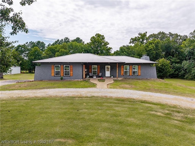 14008 White Bluff Rd, Fort Smith, AR 72916 - view of front of home featuring a front yard, covered porch, a metal roof, and view of scattered trees