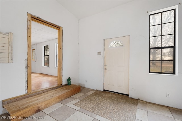 entrance foyer featuring light tile patterned flooring