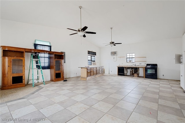 unfurnished living room featuring ceiling fan and high vaulted ceiling