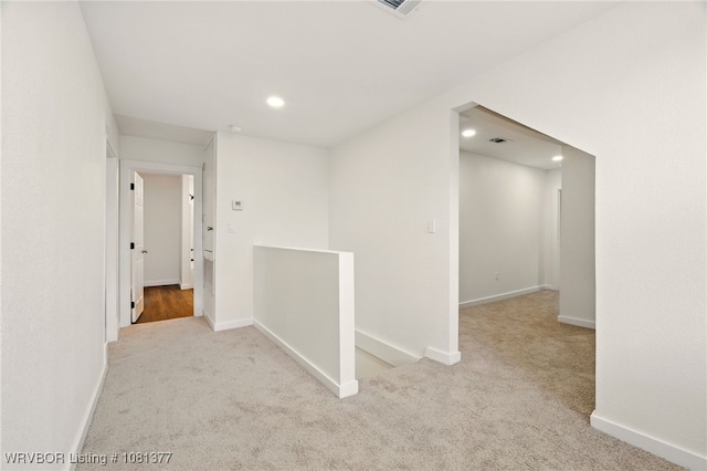 925 Cedar St, Van Buren, AR 72956 - hallway with an upstairs landing, carpet, baseboards, and recessed lighting