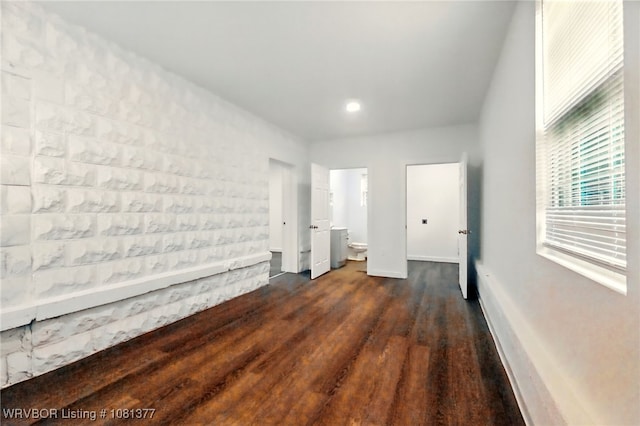 925 Cedar St, Van Buren, AR 72956 - unfurnished bedroom featuring dark wood-style floors and baseboards
