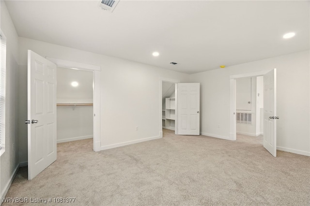 925 Cedar St, Van Buren, AR 72956 - unfurnished bedroom with a spacious closet, carpet flooring, baseboards, and recessed lighting