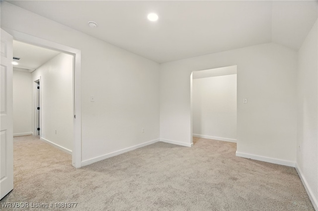 925 Cedar St, Van Buren, AR 72956 - carpeted empty room featuring baseboards, vaulted ceiling, and a smoke detector