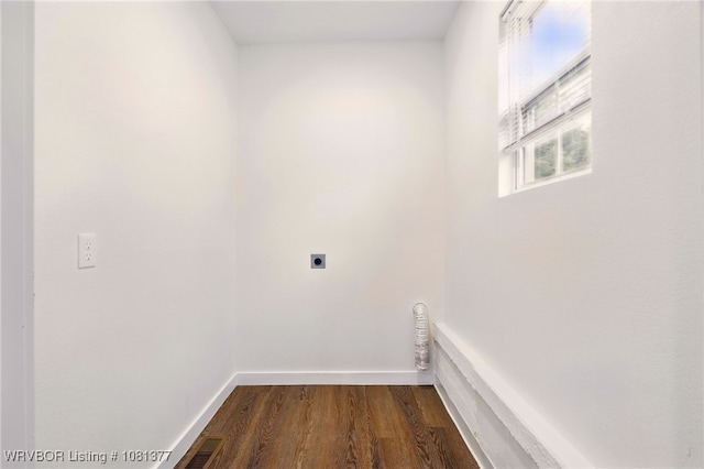 925 Cedar St, Van Buren, AR 72956 - washroom featuring hookup for an electric dryer, dark wood-style flooring, and baseboards