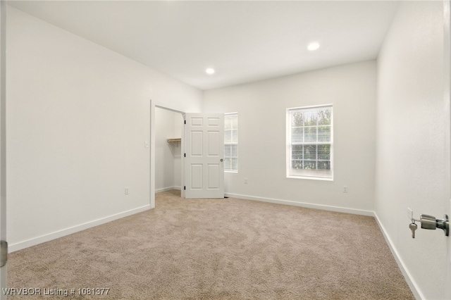 925 Cedar St, Van Buren, AR 72956 - unfurnished bedroom featuring carpet flooring, baseboards, recessed lighting, and a spacious closet
