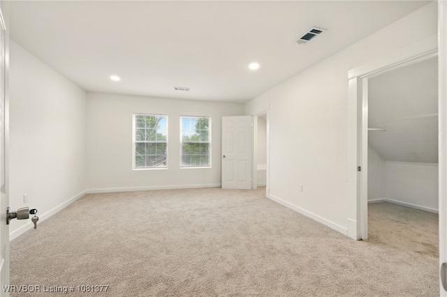 925 Cedar St, Van Buren, AR 72956 - unfurnished bedroom featuring carpet, baseboards, a walk in closet, and recessed lighting