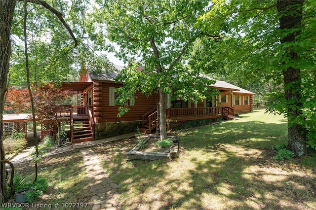 view of yard with a deck