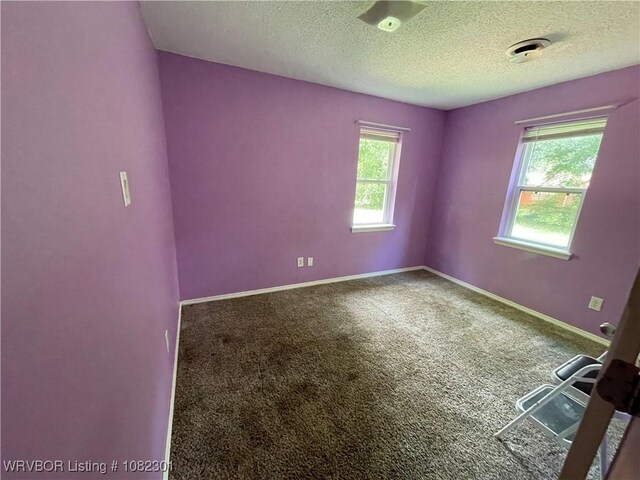 9423 Gate Nine Cutoff, Fort Smith, AR 72916 - carpeted empty room featuring a textured ceiling