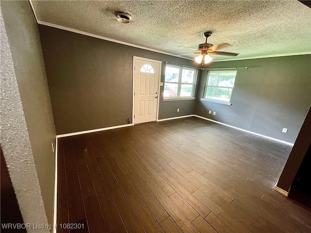 9423 Gate Nine Cutoff, Fort Smith, AR 72916 - empty room featuring ornamental molding, a ceiling fan, a textured ceiling, dark wood-type flooring, and a textured wall