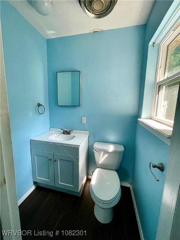 9423 Gate Nine Cutoff, Fort Smith, AR 72916 - bathroom with vanity and wood finished floors