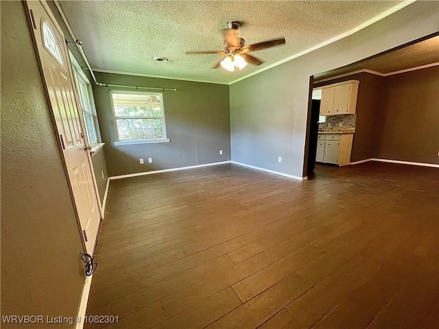 9423 Gate Nine Cutoff, Fort Smith, AR 72916 - unfurnished room featuring a textured ceiling, crown molding, a ceiling fan, and dark wood-style flooring