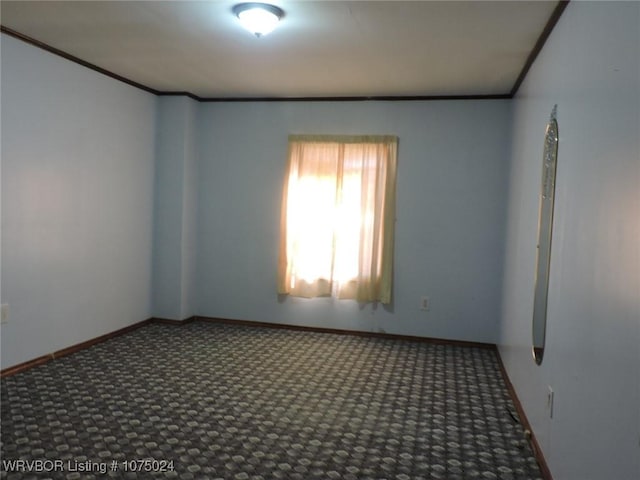 carpeted empty room with crown molding