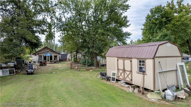 view of yard with a storage shed