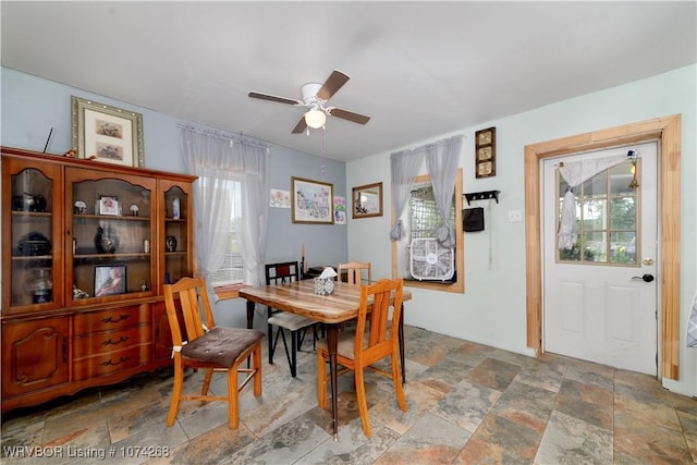 dining room featuring ceiling fan