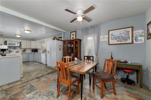 dining area featuring ceiling fan