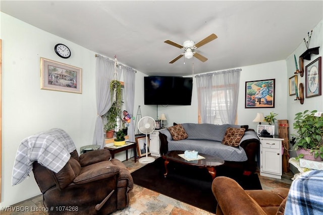 living room featuring ceiling fan