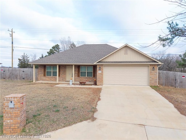 ranch-style house with a garage and a front lawn