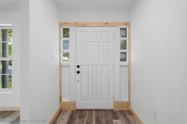 1703 E Edmondson Dr, Sallisaw, OK 74955 - foyer entrance featuring dark wood finished floors and baseboards