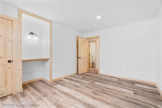 1703 E Edmondson Dr, Sallisaw, OK 74955 - empty room with baseboards, wood finished floors, and recessed lighting