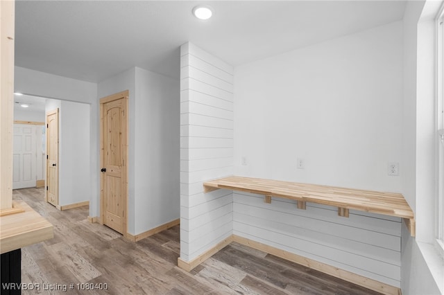 1703 E Edmondson Dr, Sallisaw, OK 74955 - hallway with baseboards, recessed lighting, and wood finished floors