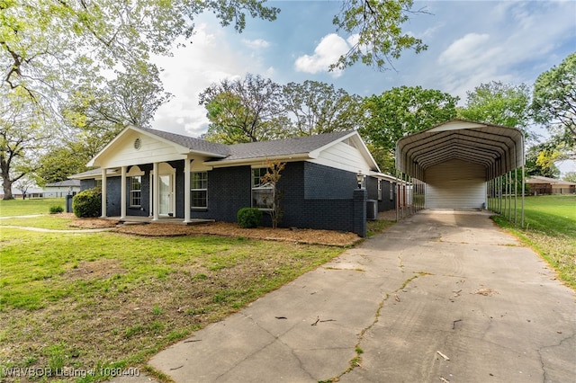 1703 E Edmondson Dr, Sallisaw, OK 74955 - view of front of property featuring a front yard, a carport, brick siding, and driveway