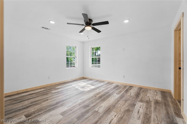 1703 E Edmondson Dr, Sallisaw, OK 74955 - unfurnished room featuring wood finished floors, baseboards, recessed lighting, and a ceiling fan