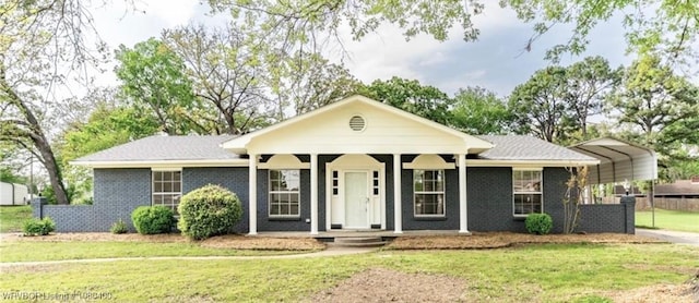 1703 E Edmondson Dr, Sallisaw, OK 74955 - ranch-style home with a front yard, a carport, and brick siding