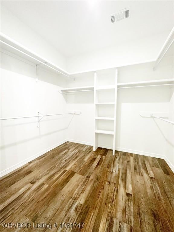 2060 W Breckenridge St, Sallisaw, OK 74955 - spacious closet featuring wood finished floors