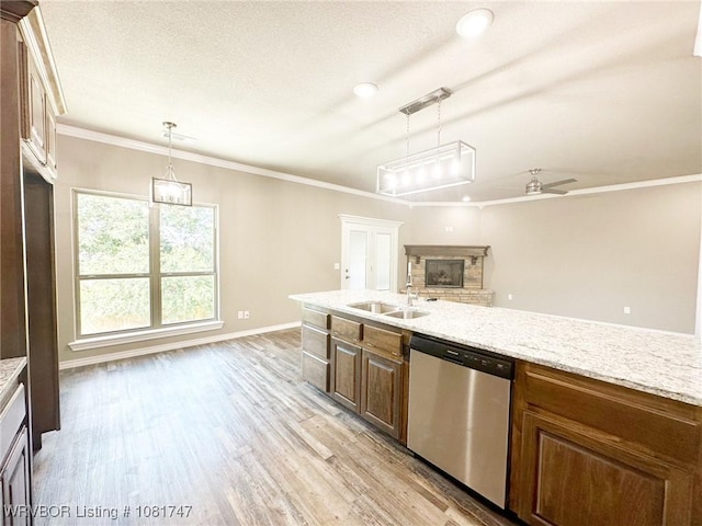 2060 W Breckenridge St, Sallisaw, OK 74955 - kitchen with dishwasher, a ceiling fan, ornamental molding, light stone countertops, and light wood-style flooring