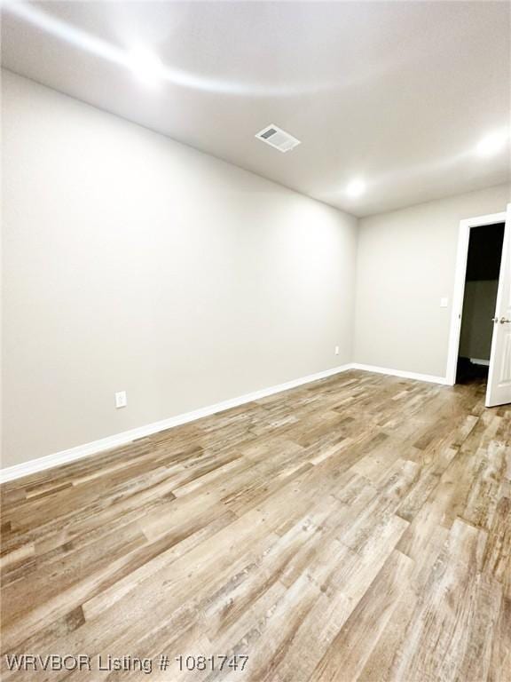 2060 W Breckenridge St, Sallisaw, OK 74955 - unfurnished room with light wood finished floors and baseboards